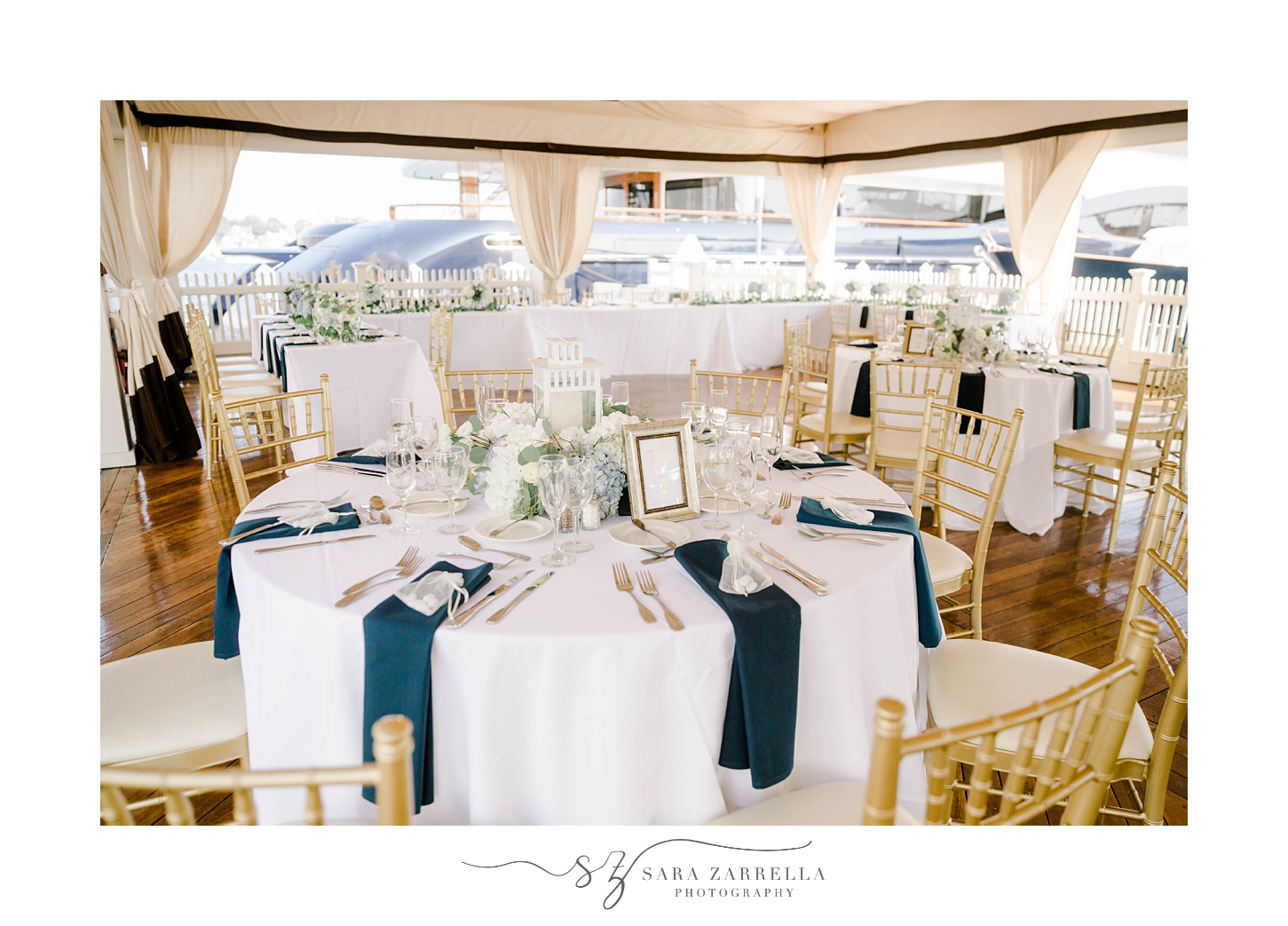 Regatta Place wedding reception with navy and gold details