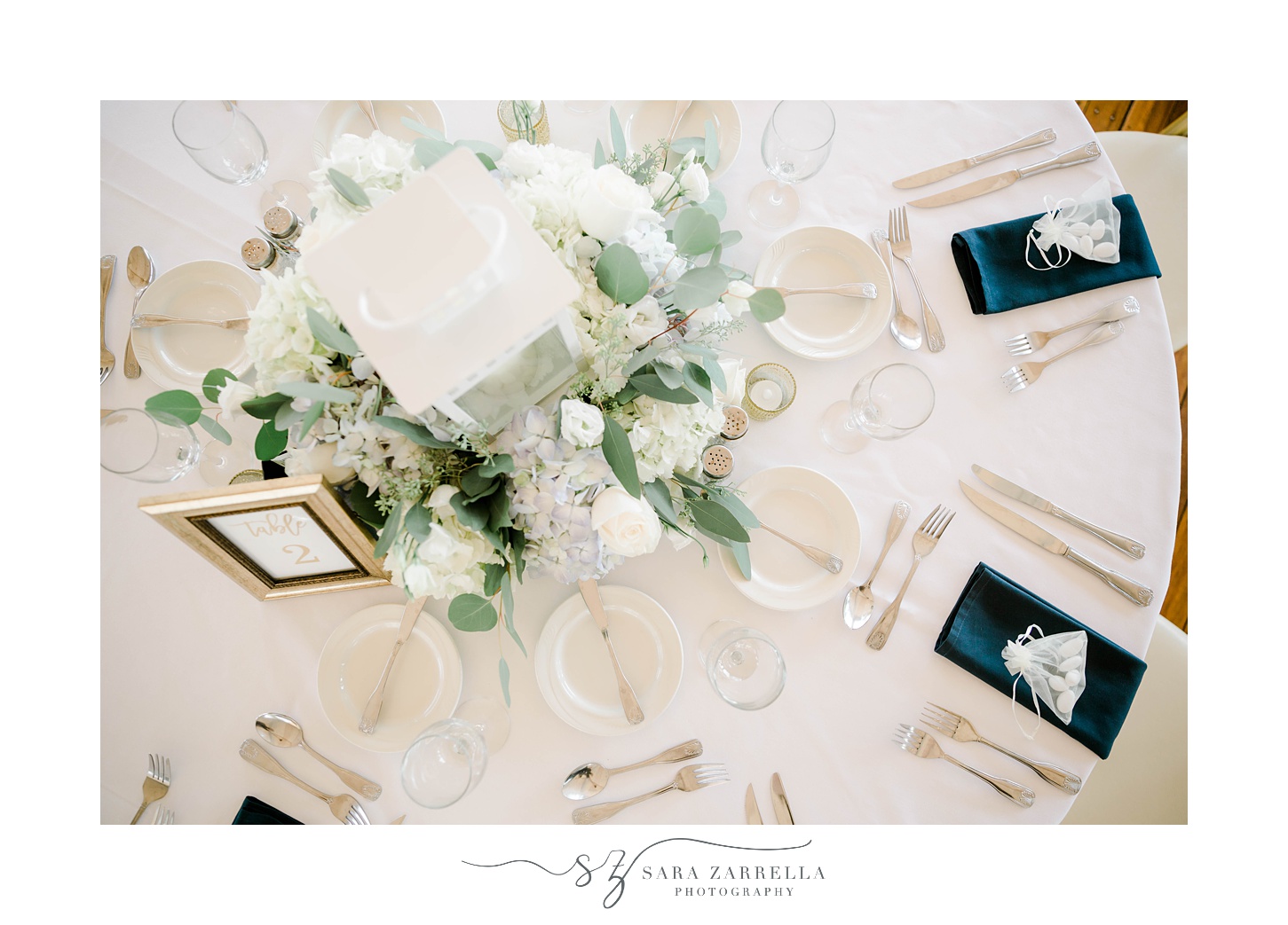 wedding reception with navy and gold details at Regatta Place