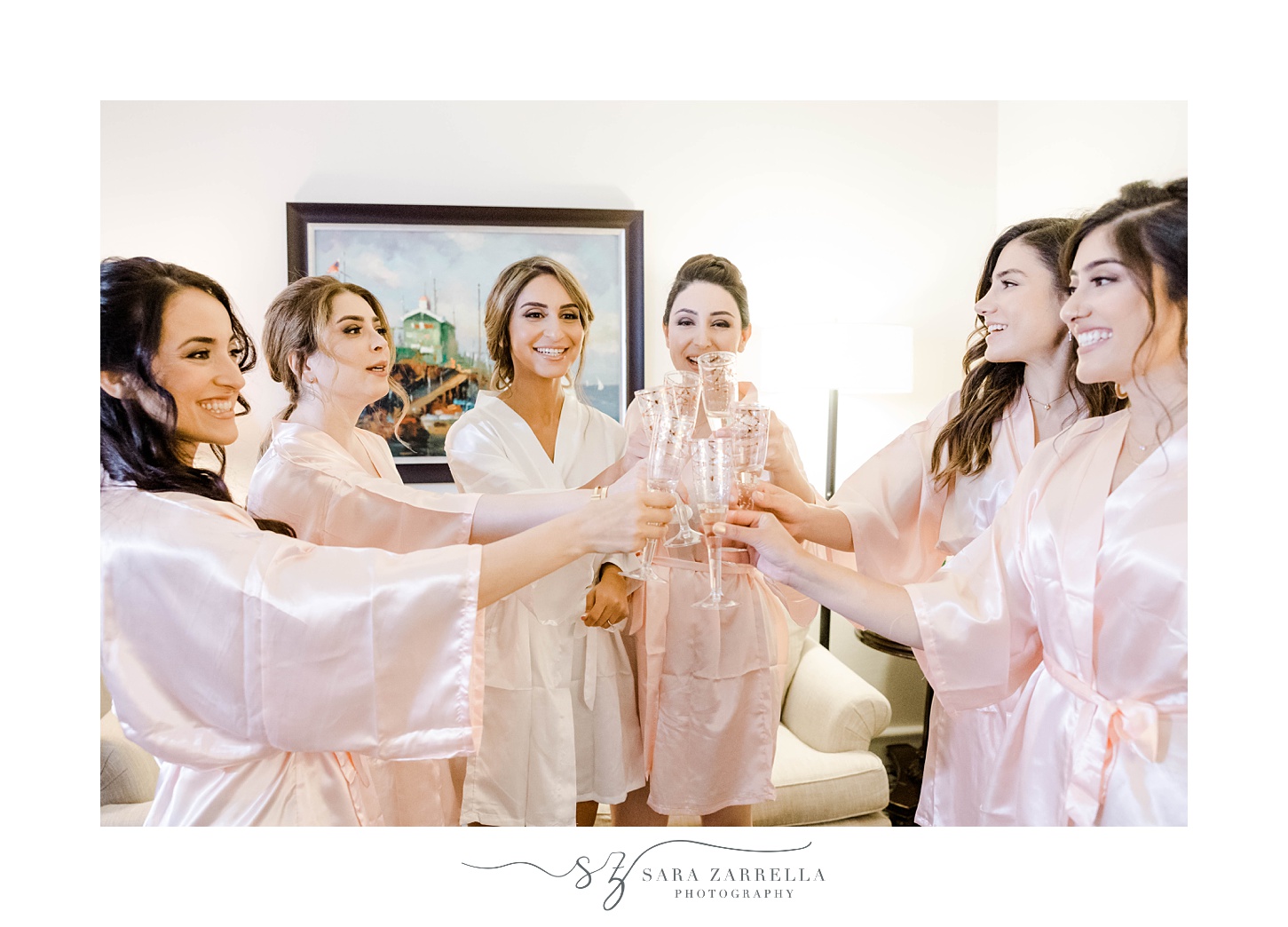 bride and bridesmaids toast with champagne at the Viking Hotel