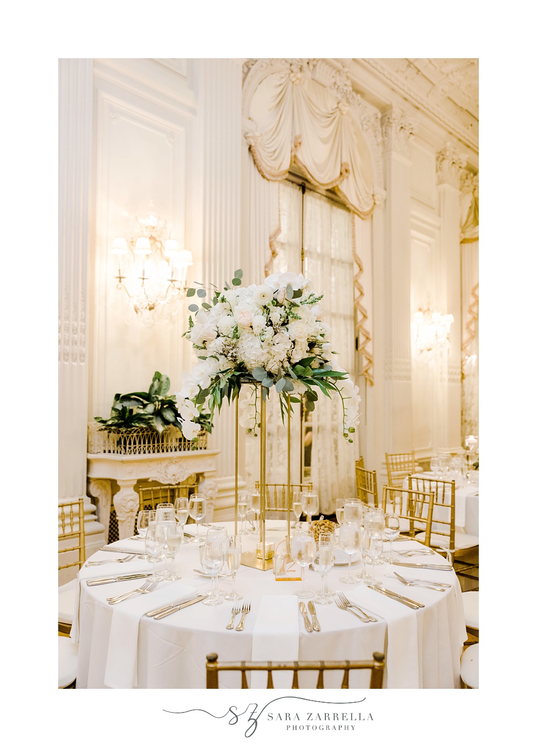 tall floral centerpiece with white flowers