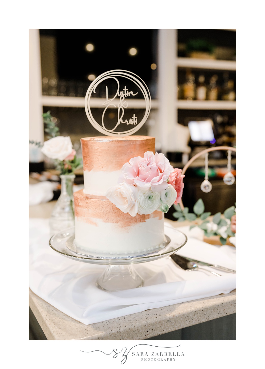 tiered wedding cake with copper icing