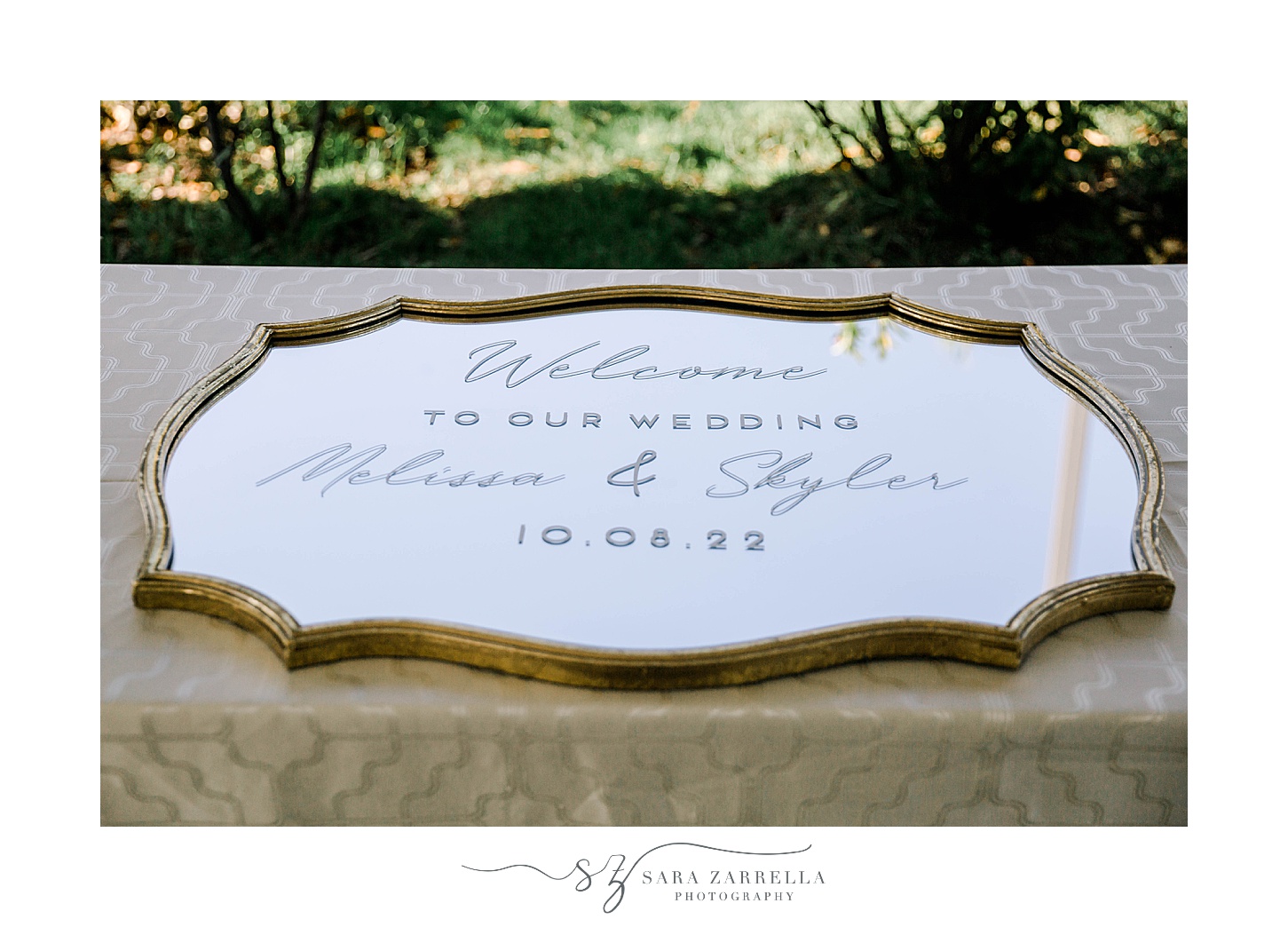 welcome sign on gold mirror for fall wedding 
