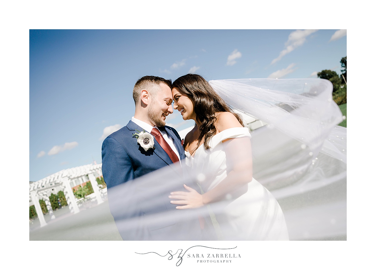 bride and groom pose with foreheads touching at Atlantic Resort Wyndham