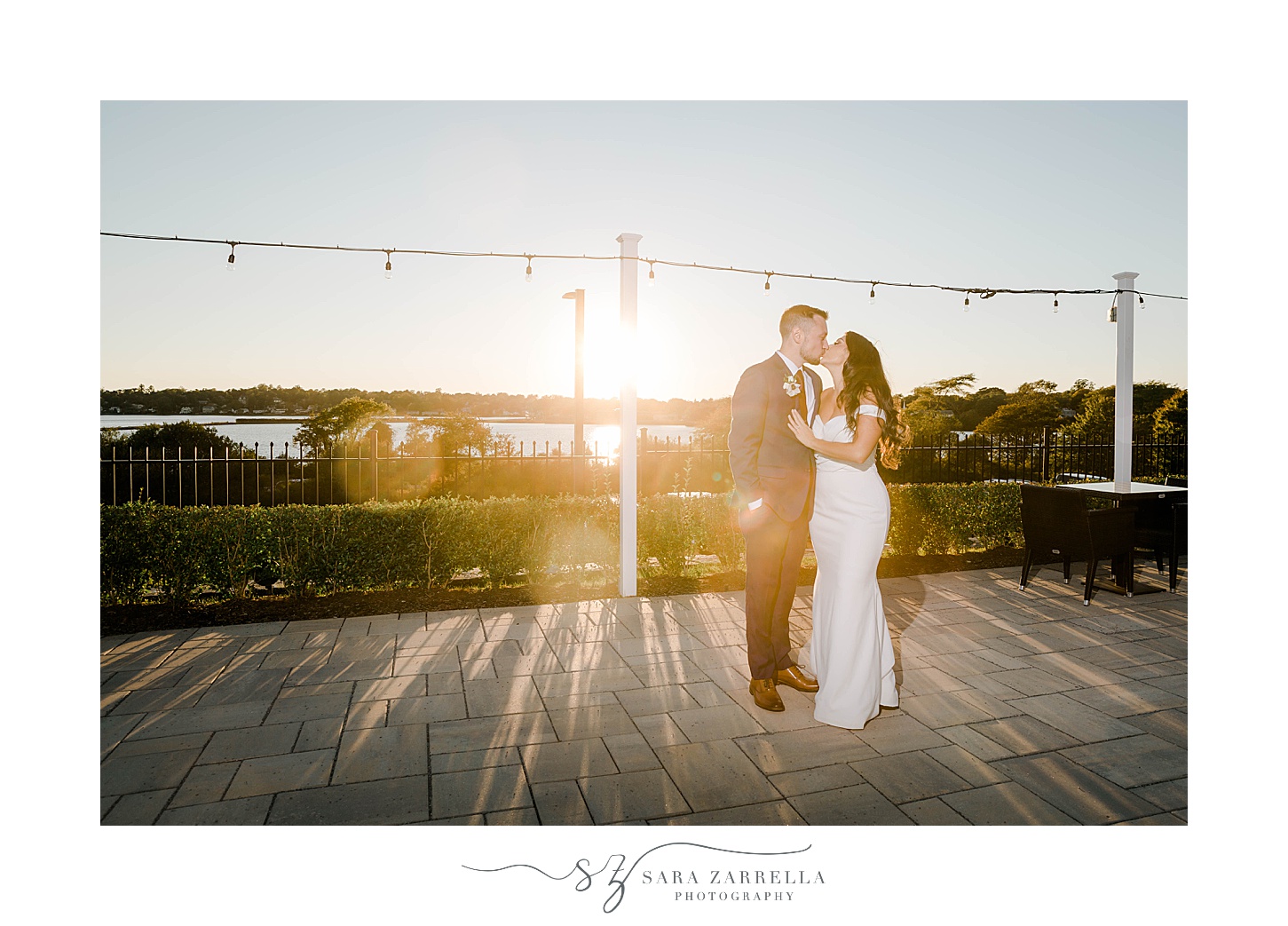 sunset portrait of bride and groom on wooden deck at Atlantic Resort Wyndham