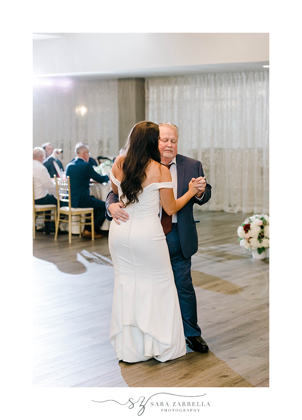 bride dances with dad in navy suit in Newport RI