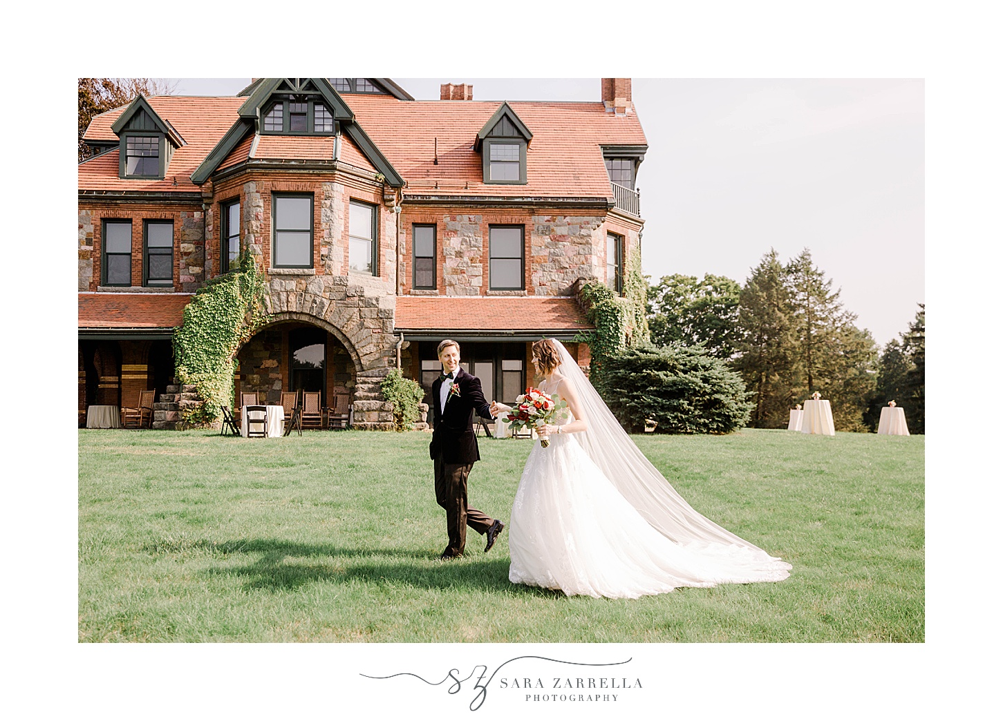 bride and groom walk on lawn at Eustis Estate
