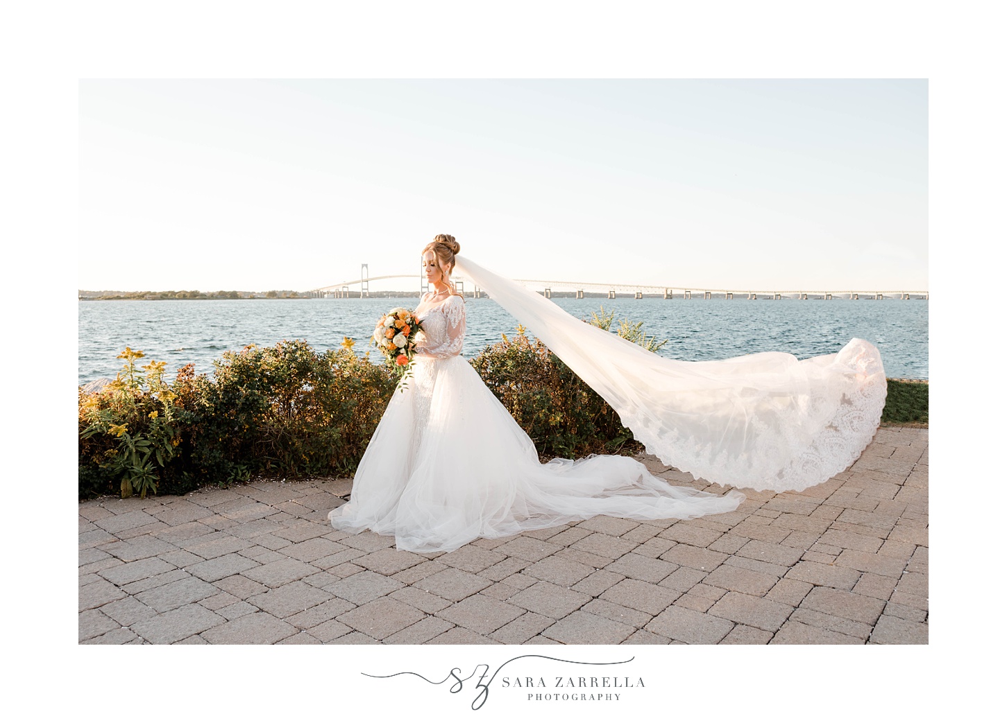 bridal portrait of bride with veil behind them in Newport RI