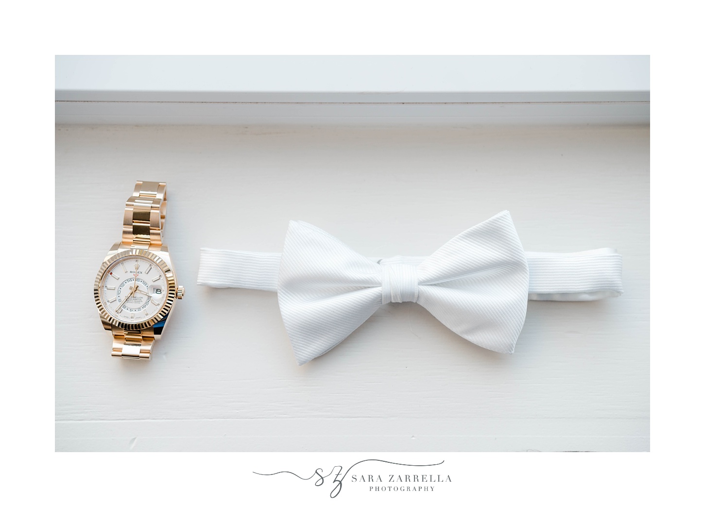 groom's white tie and gold watch in Newport RI 
