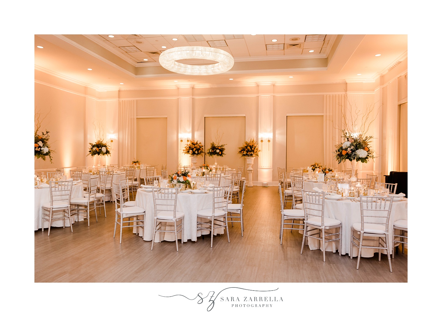 Newport Harbor Island Resort wedding reception with orange and white flowers 