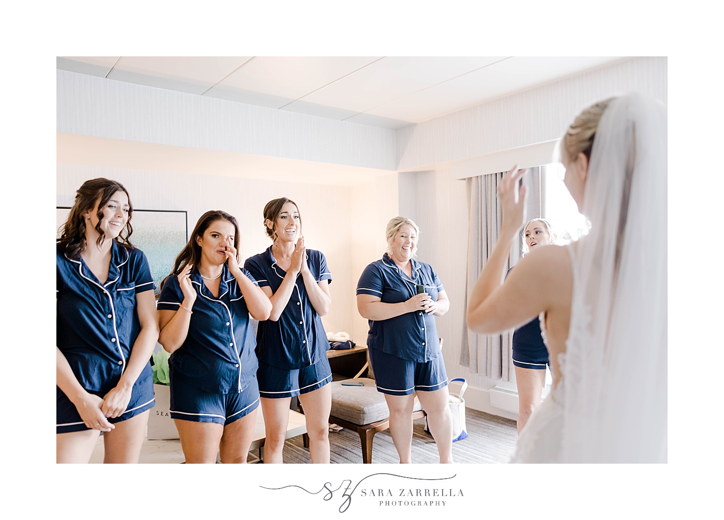 bride has first look with bridesmaids at Newport Harbor Island Resort