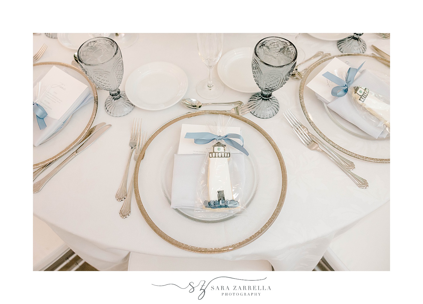 place setting with custom lighthouse cookies on plates