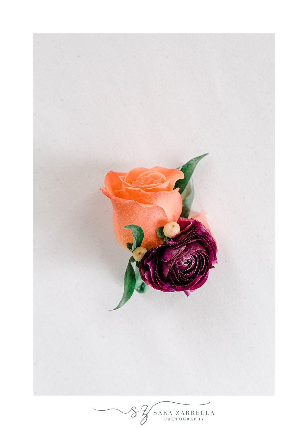 peach and pink floral boutonnières 
