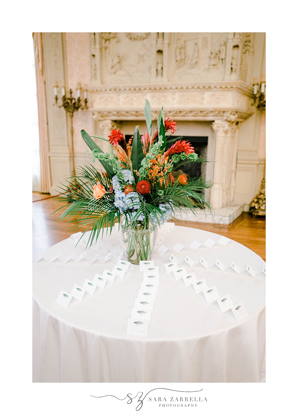 seating cards with big floral arrangement in Newport RI