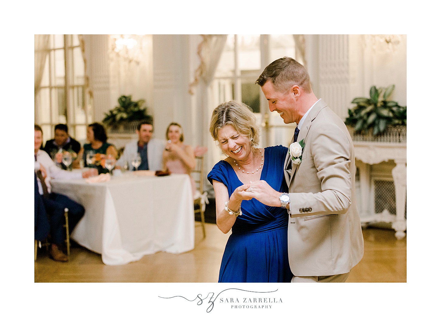groom dances with mother during Newport RI wedding reception