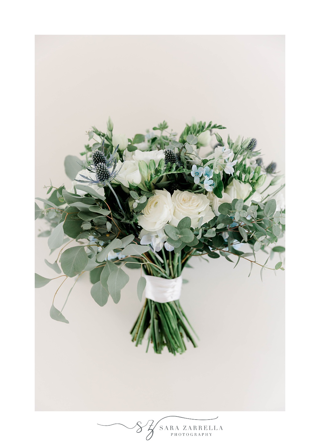 bride's bouquet for wedding at Belle Mer with blue and white flowers 