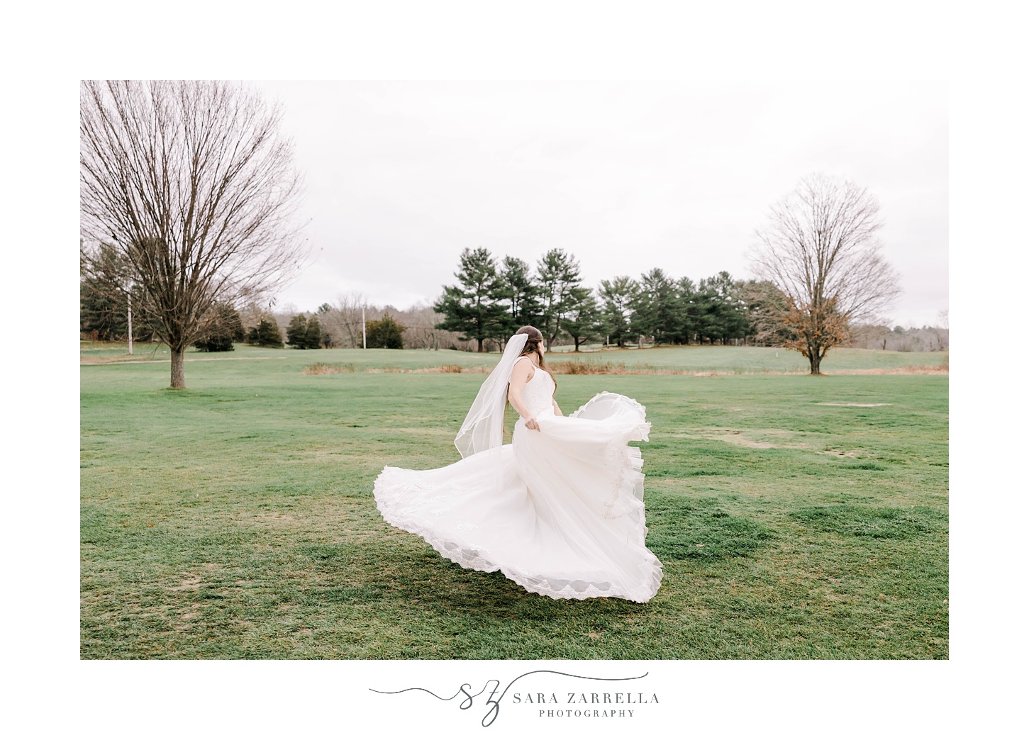 bride twirls wedding gown on lawn at Foster Country Club