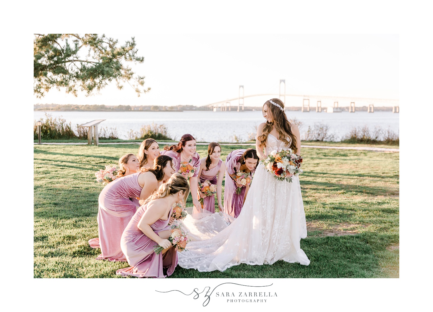 bridesmaids adjust bride's gown for her at Newport Harbor Island Resort