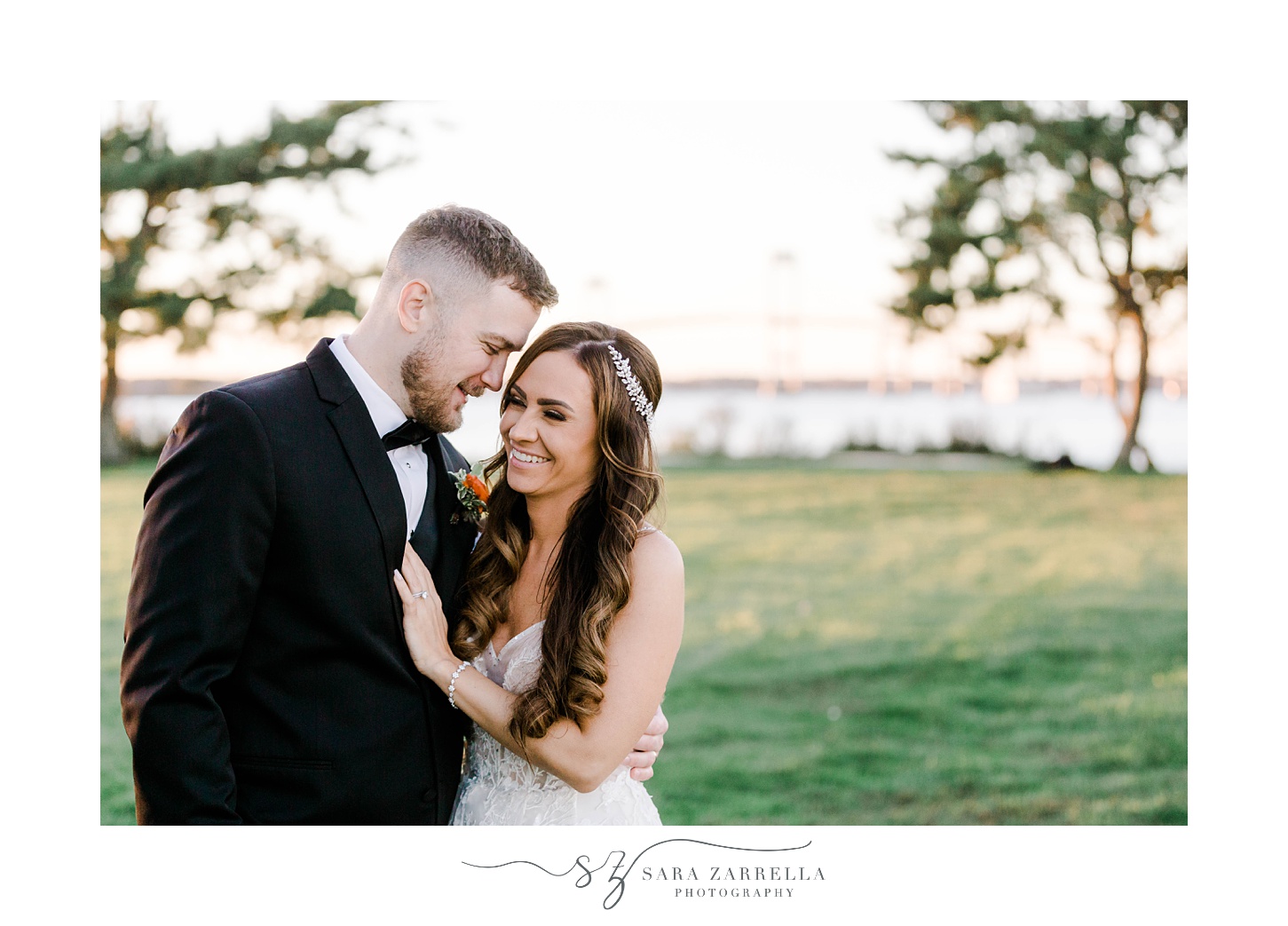 bride and groom laugh together during portraits on lawn at Newport Harbor Island Resort
