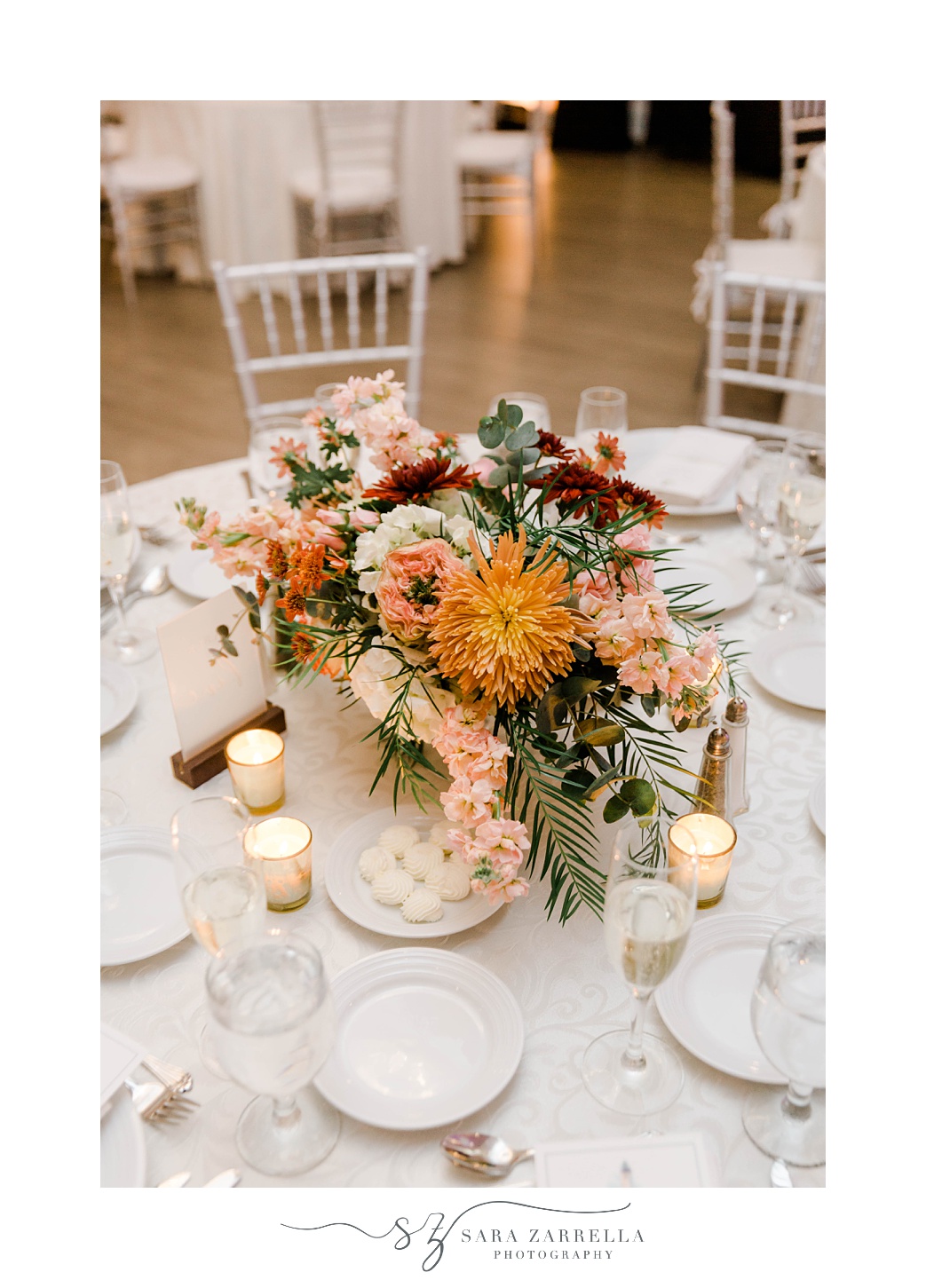 fall wedding centerpieces with orange and red flowers 