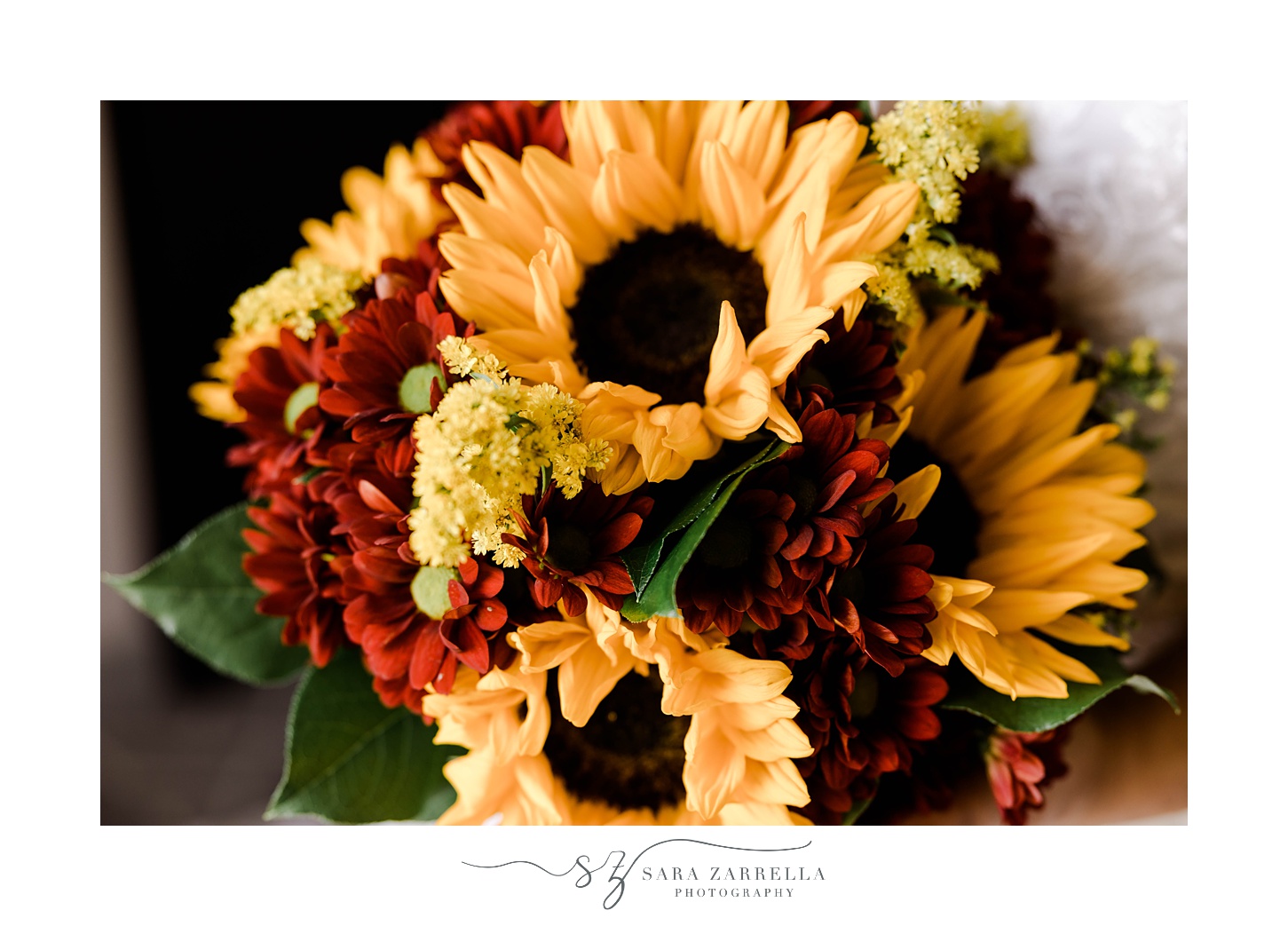 sunflowers and red flowers in bouquet for fall wedding 
