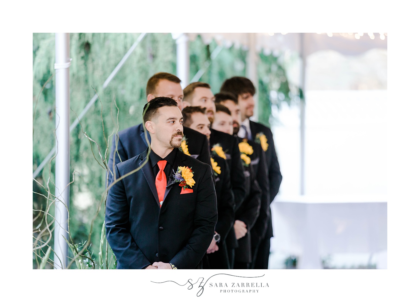 groom watches bride walking down aisle for ceremony at Quidnessett Country Club