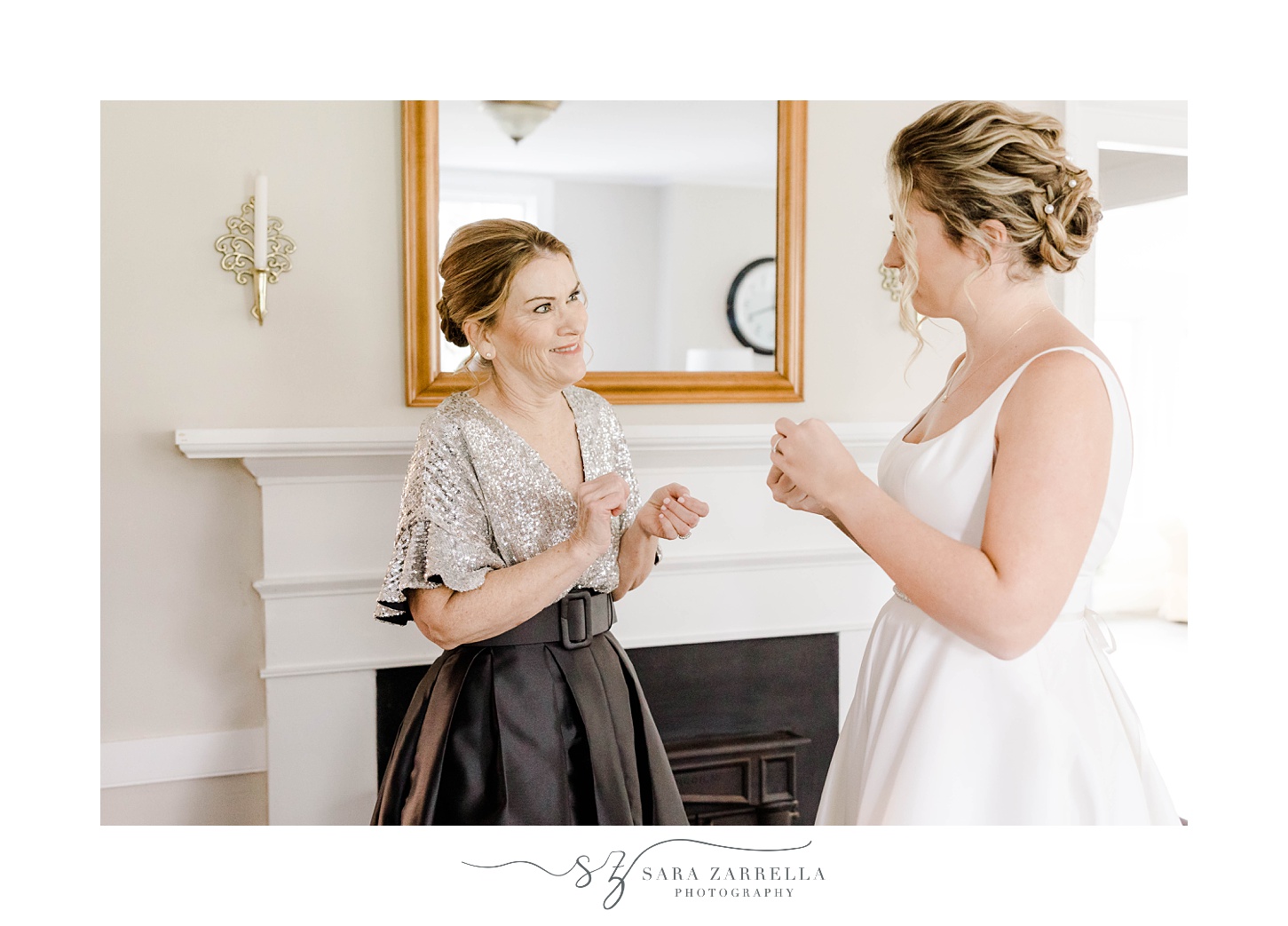 mother talks to bride while preparing for RI wedding 