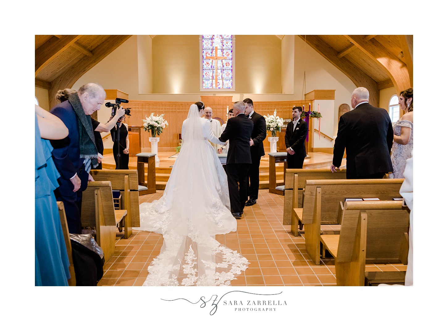 father gives away bride during traditional church wedding in Providence, RI