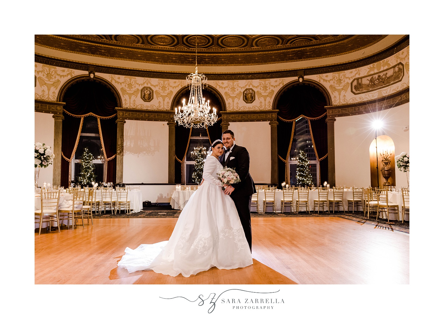 bride and groom pose in ballroom at The Graduate Providence