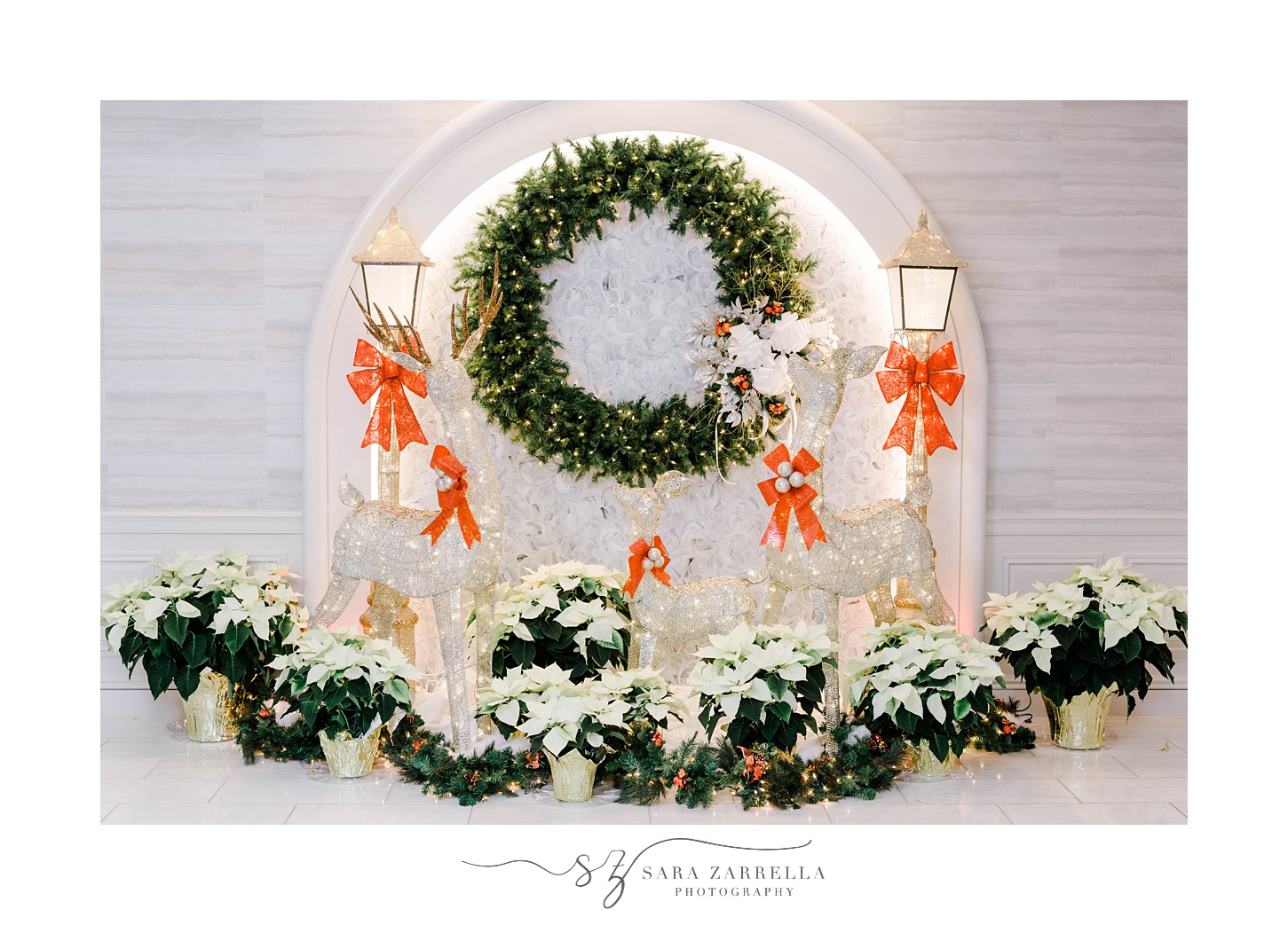 Christmas wreath and lanterns on display at Quidnessett Country Club