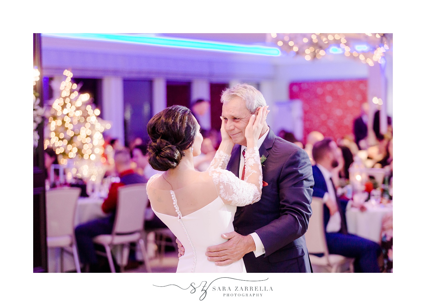 bride dances with father during winter wedding reception