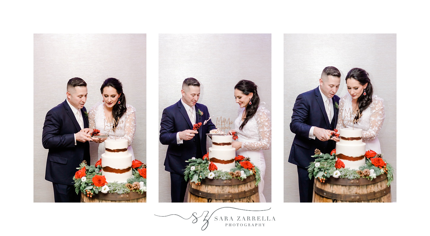 newlyweds cut wedding cake at winter wedding reception