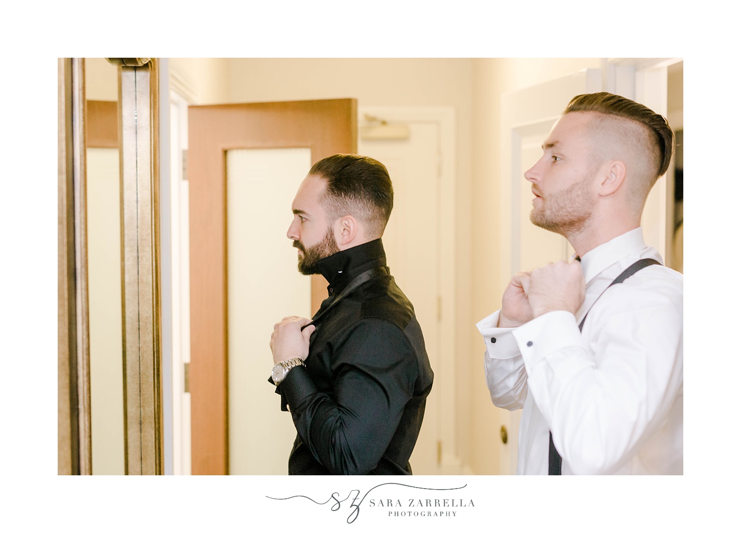 groom prepares with groomsman for Belle Mer wedding 