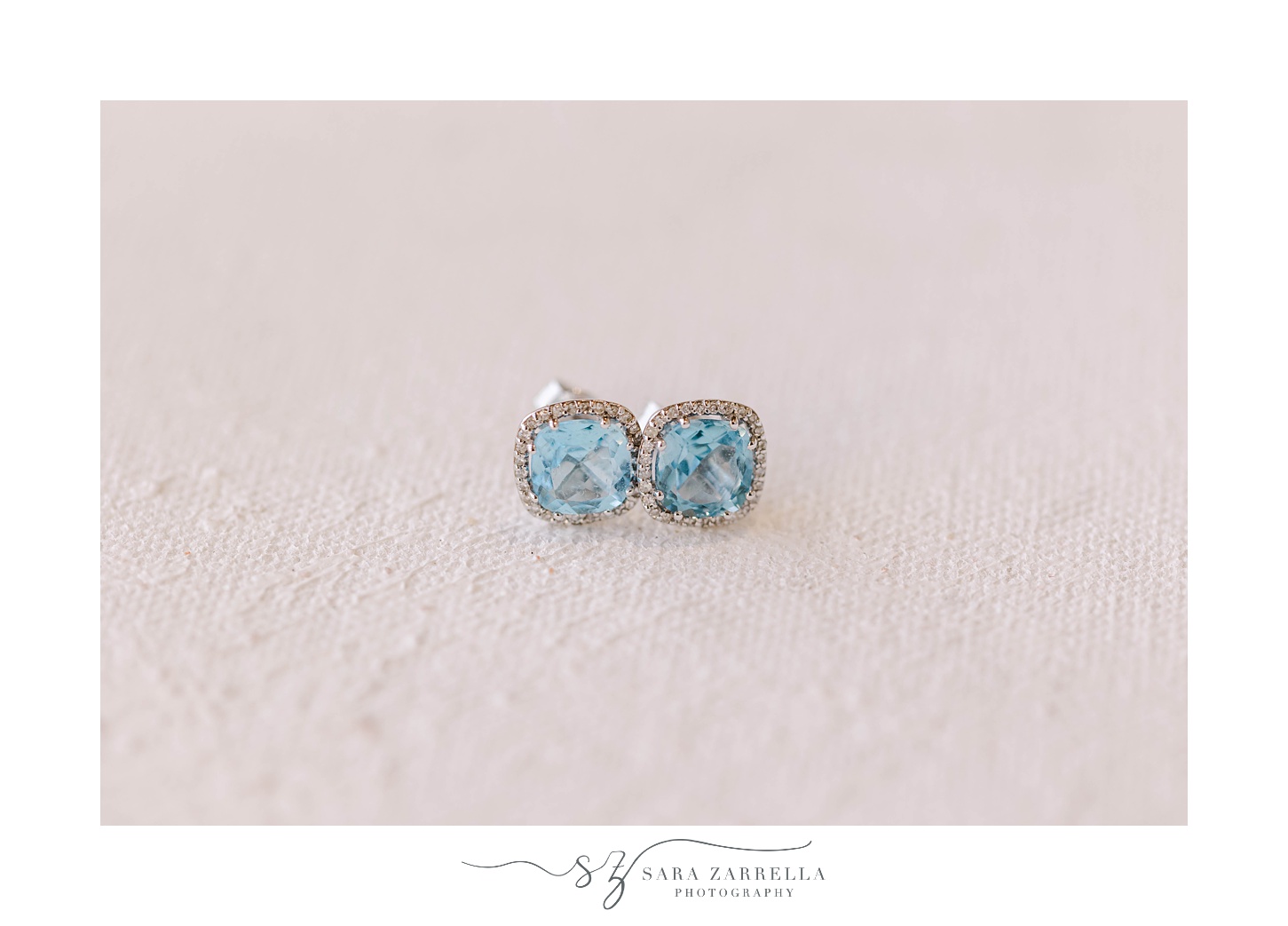 bride's blue and silver earrings for winter wedding 
