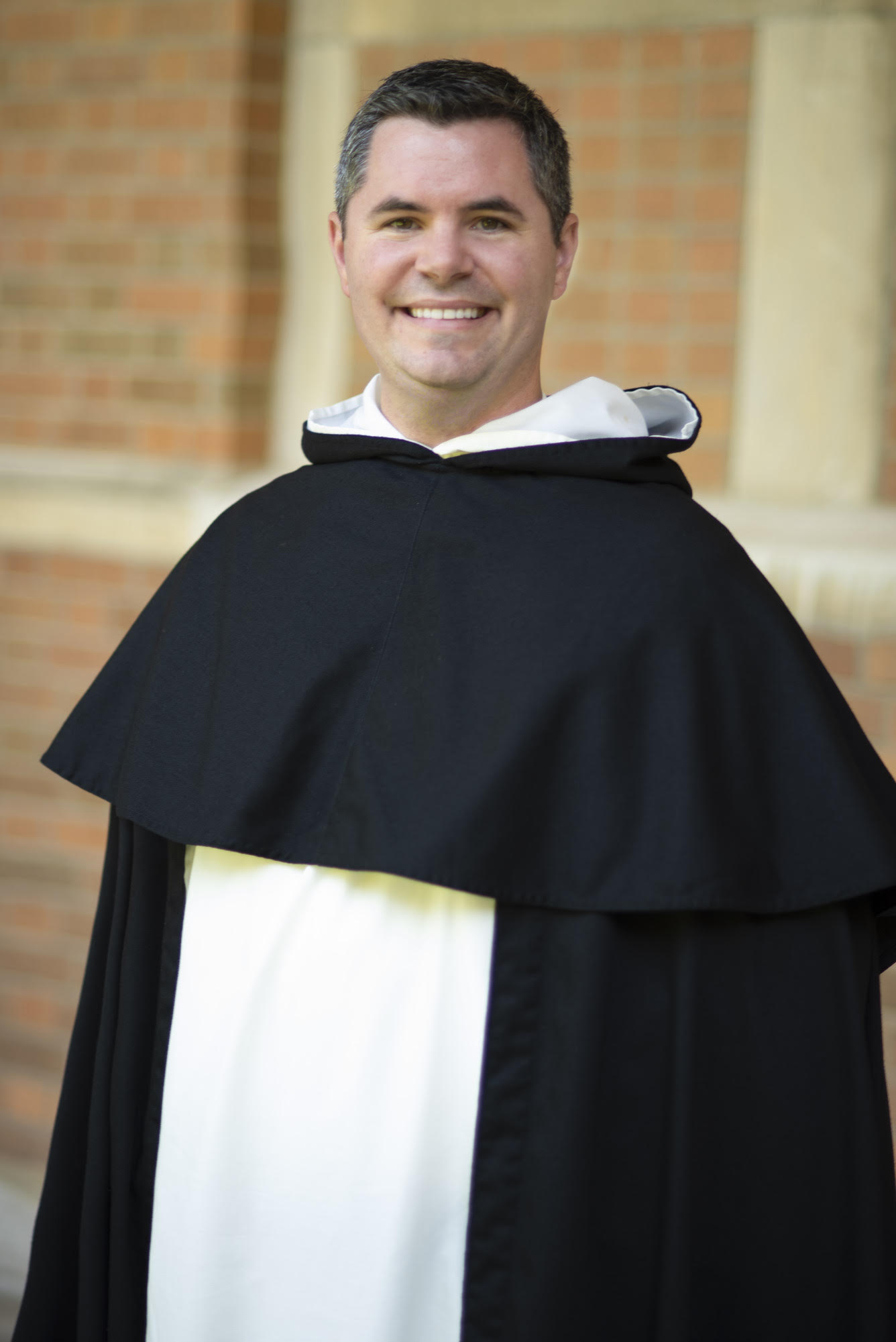 Father Patrick Briscoe photographed in clergy wear 