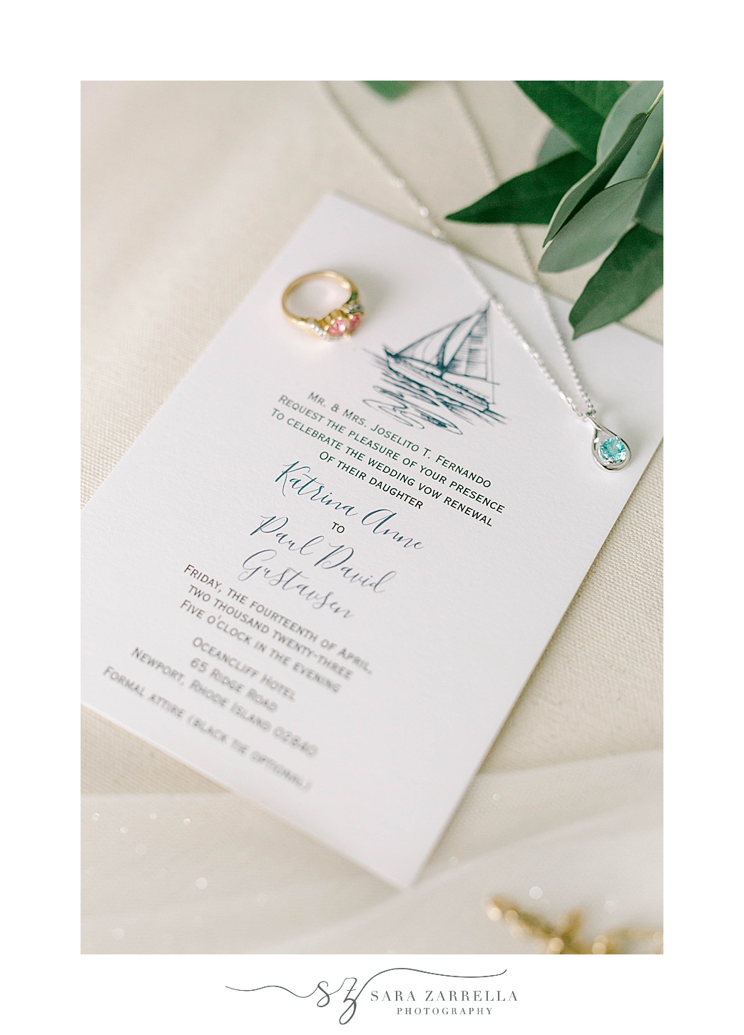 custom wedding invitation with blue sailboat on top