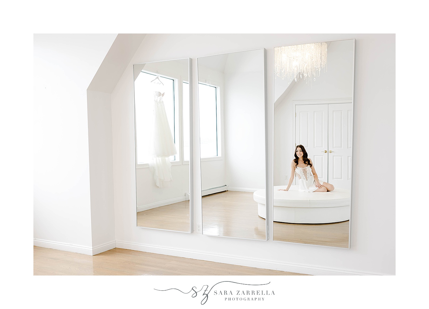 bride sits on white ottoman inside suite at Belle Mer Island House