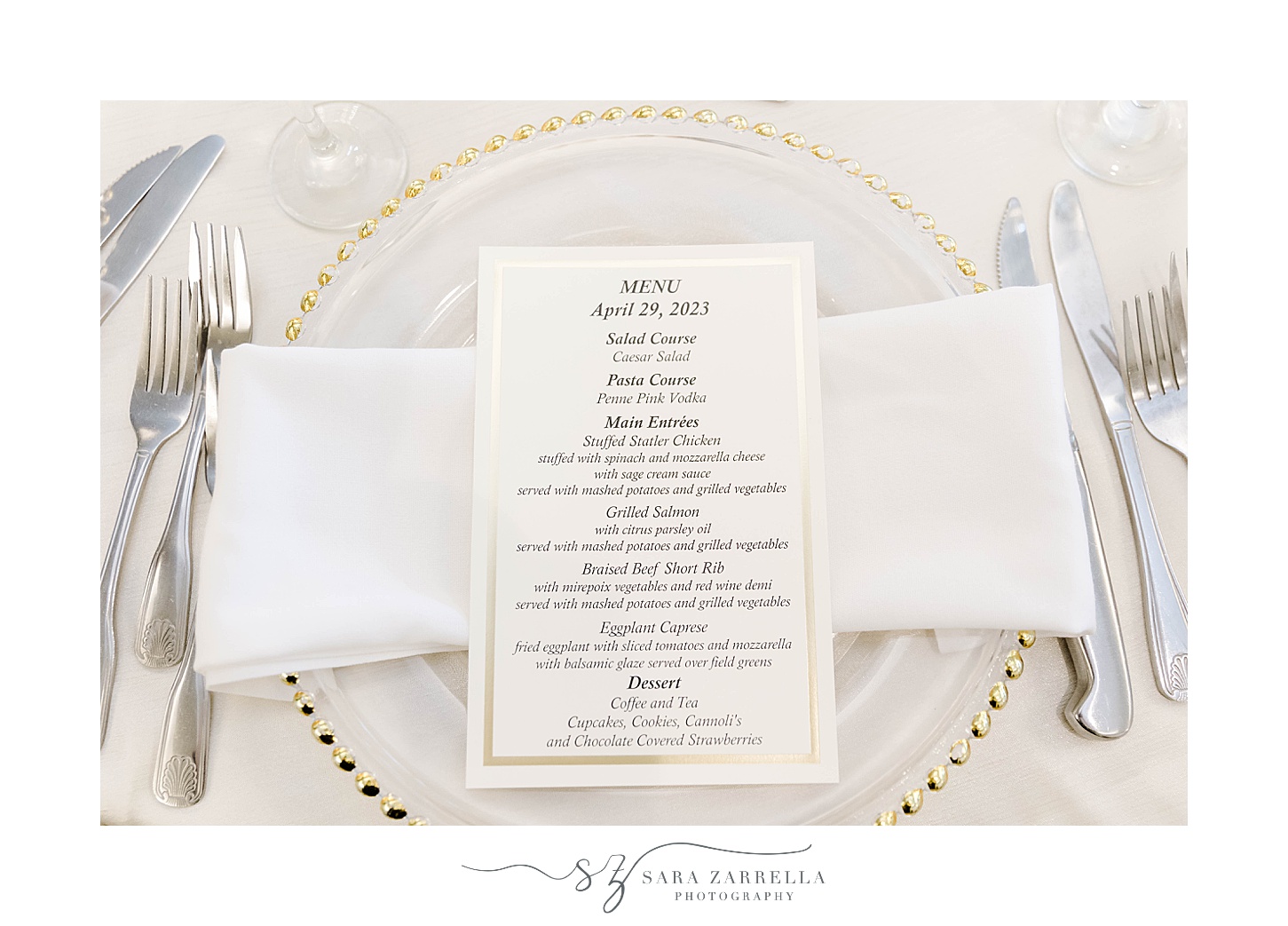 place setting with menu card on white napkin at Kirkbrae Country Club wedding reception