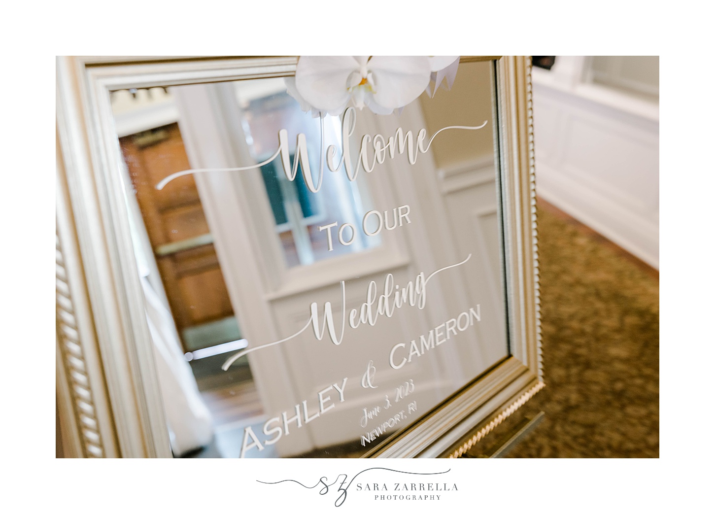welcome sign on mirror with gold frame for spring OceanCliff Hotel wedding
