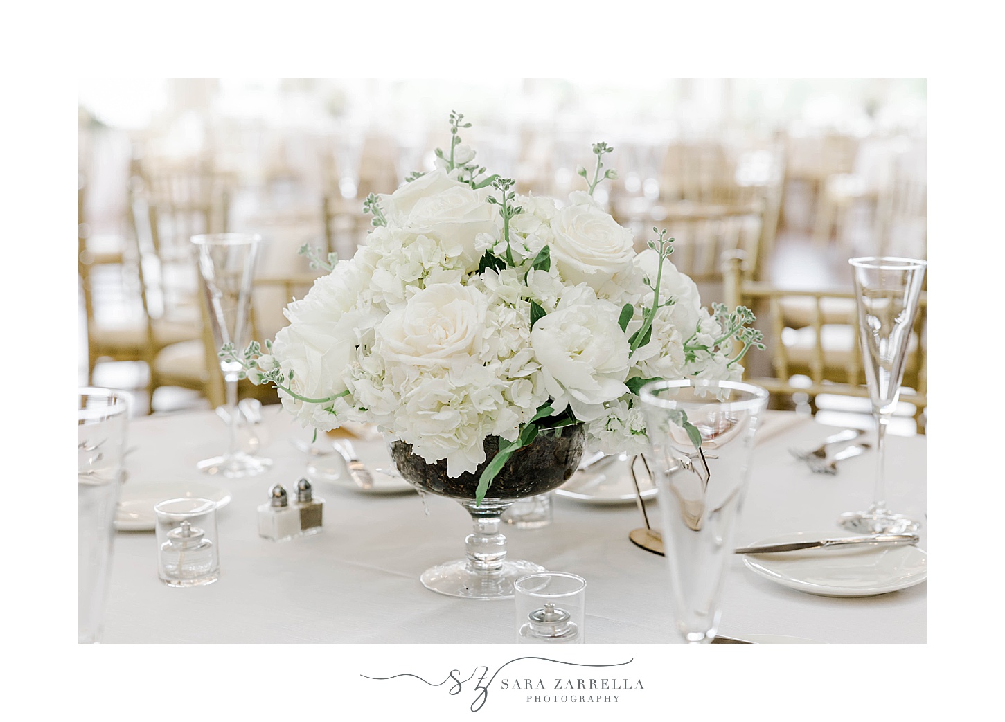 floral centerpieces with white roses and baby's breath 