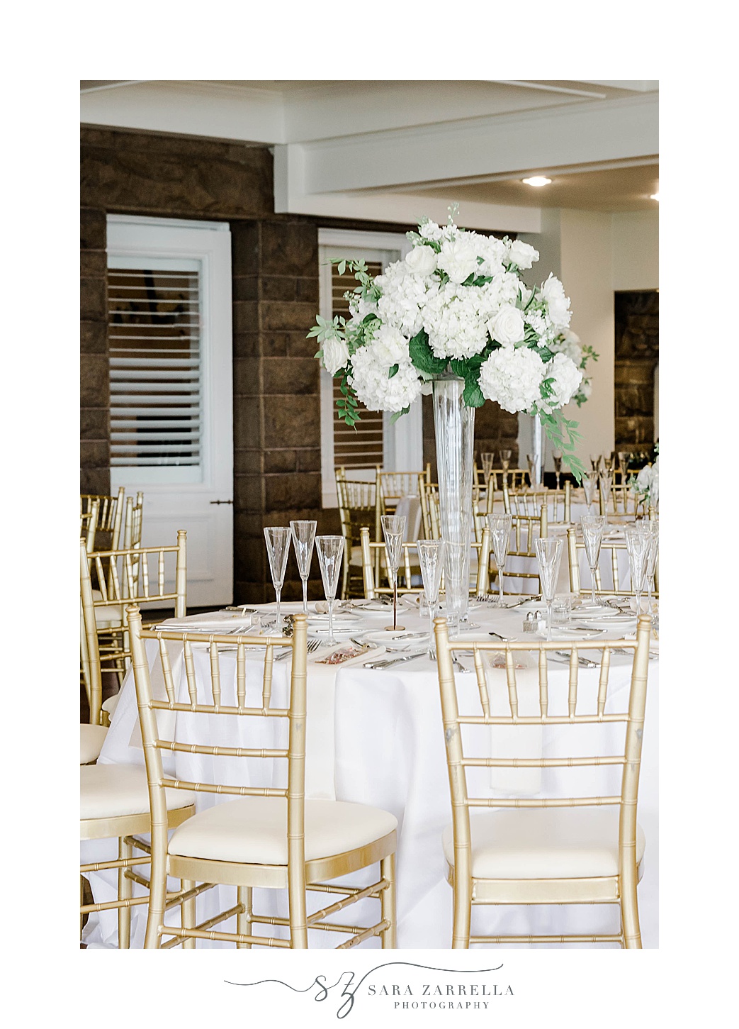 spring OceanCliff Hotel wedding reception with white and gold details 