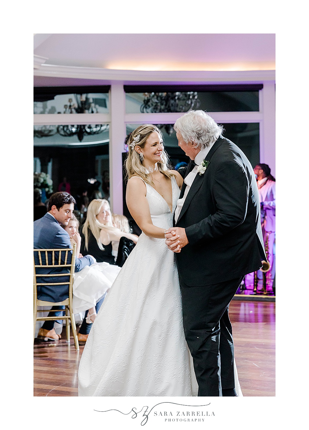 bride and dad dance together during spring OceanCliff Hotel wedding reception 