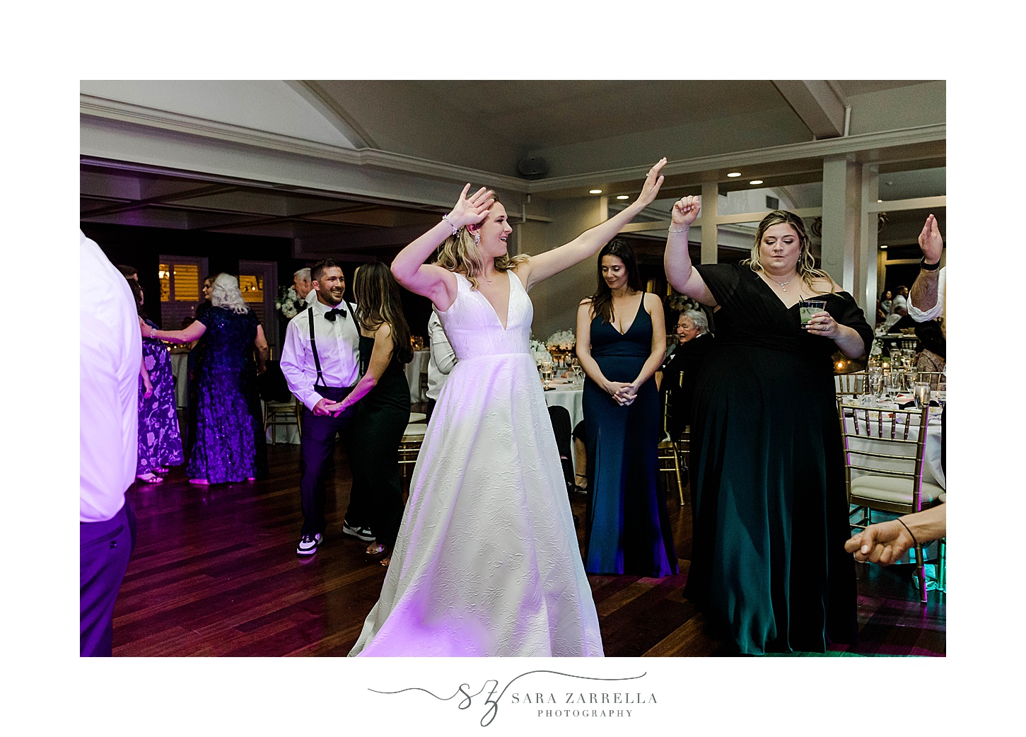 bride dances with bridesmaids during wedding reception in Newport  RI