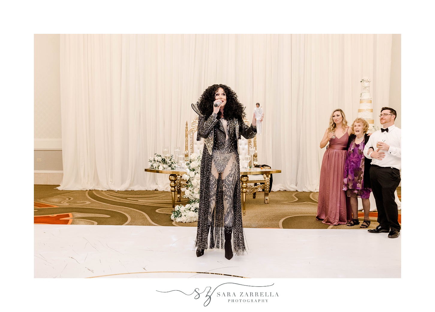 Cher impersonator sings during Omni Providence Hotel wedding reception