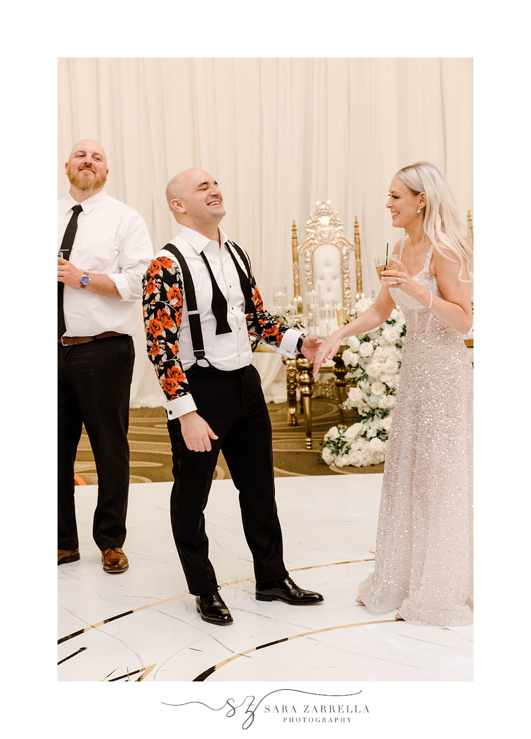 groom and bride laugh during Omni Providence Hotel wedding reception