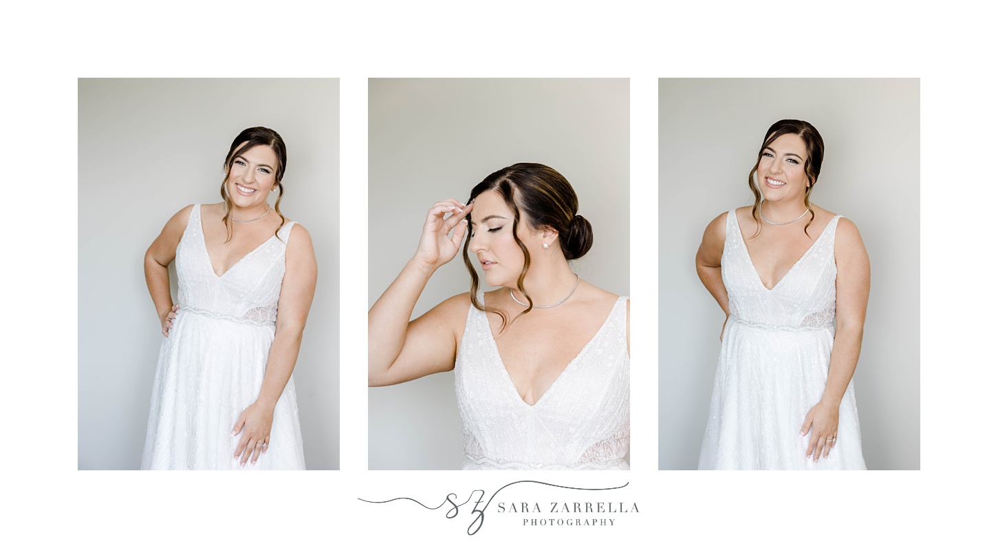 bride stands in wedding dress with v-neck and classic updo