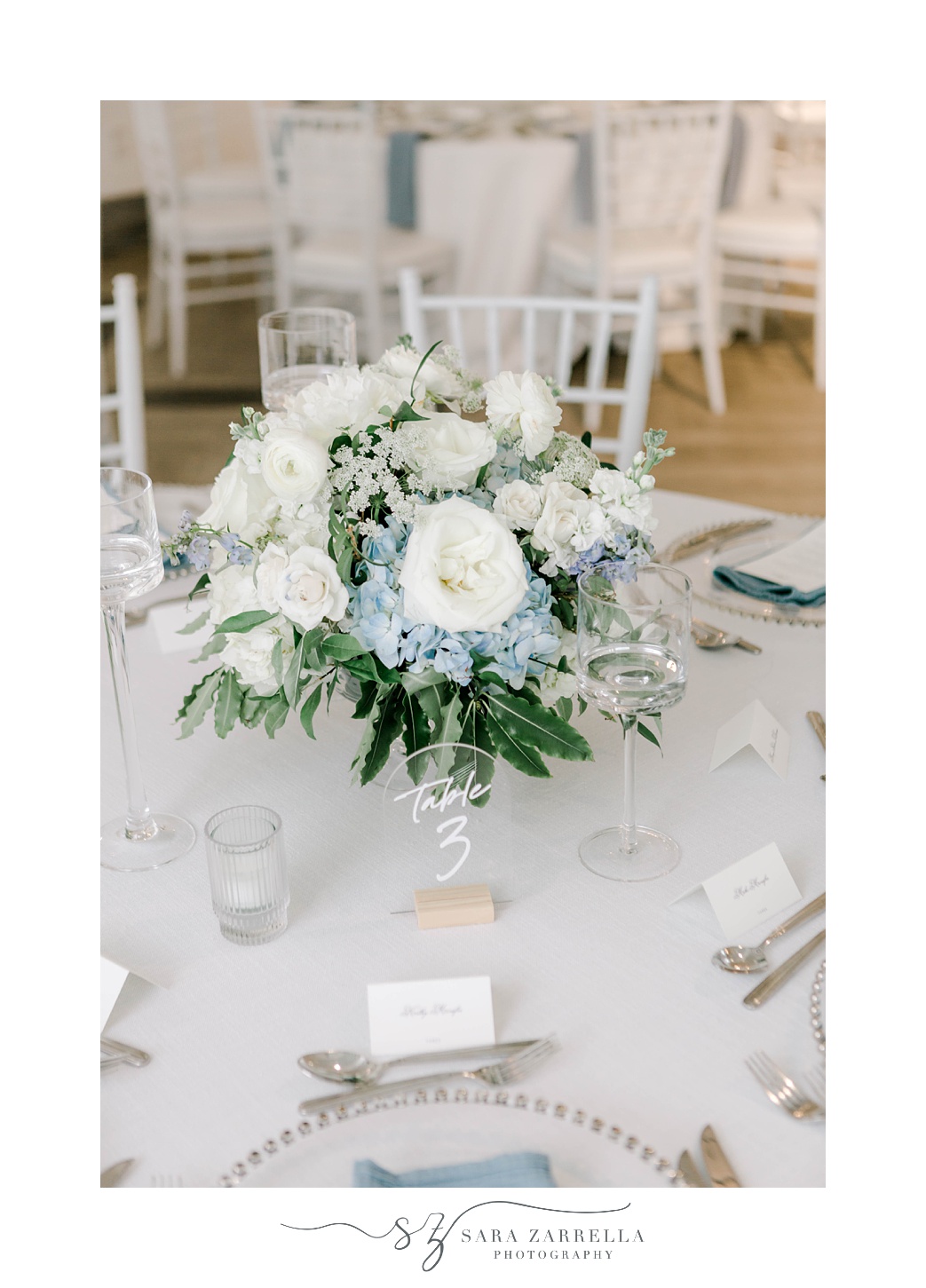 floral centerpiece with white and blue flowers for elegant Newport Beach House wedding reception