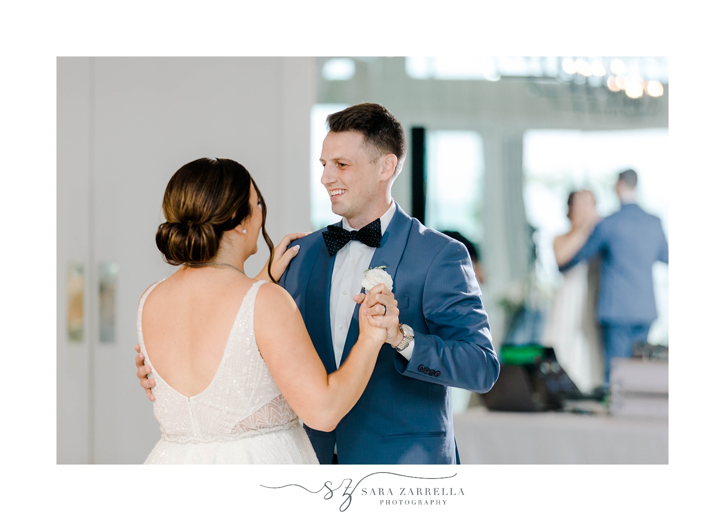 bride and groom dance together during Newport RI wedding reception