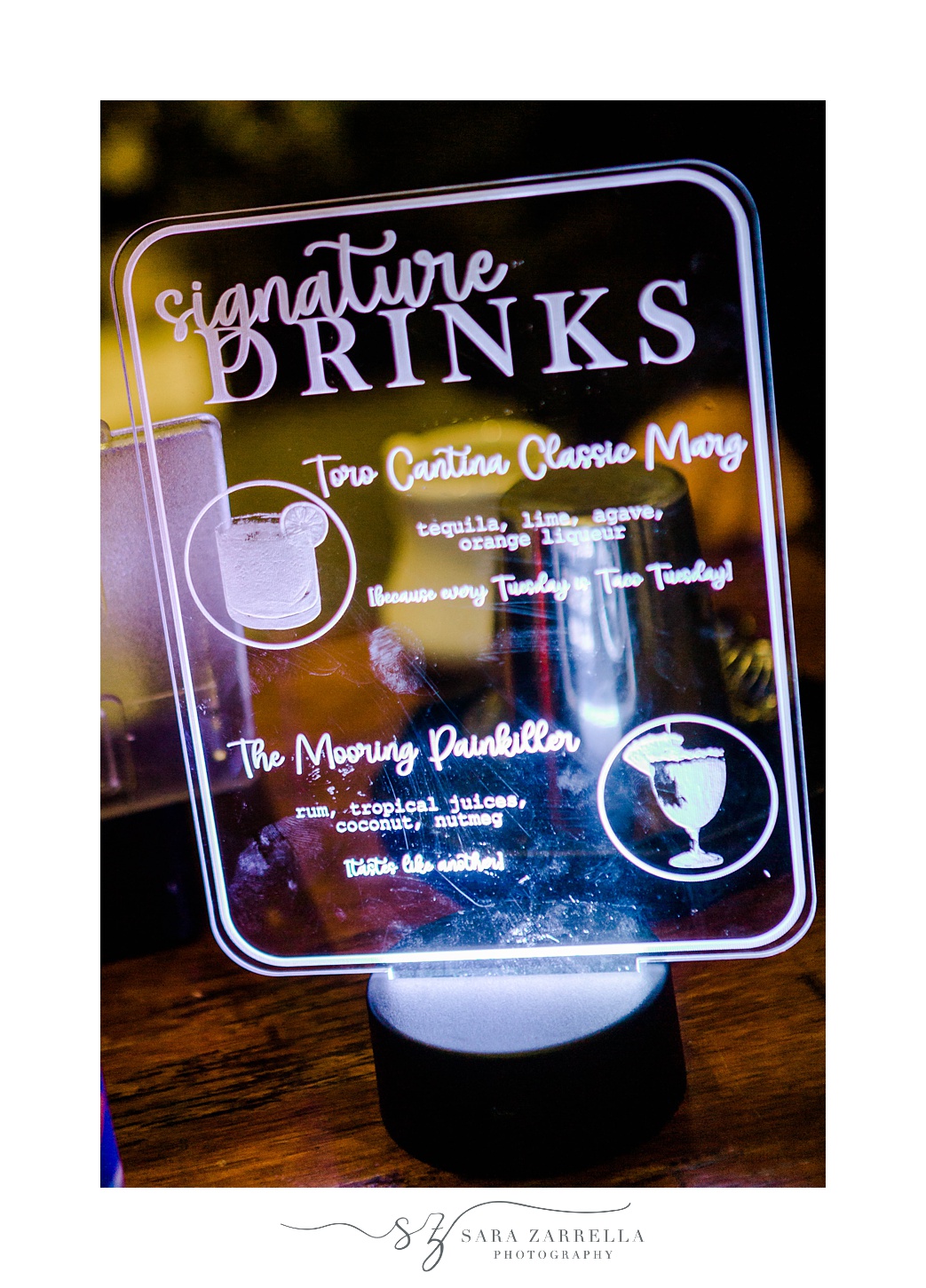 acrylic sign for signature drinks at OceanCliff Hotel wedding reception