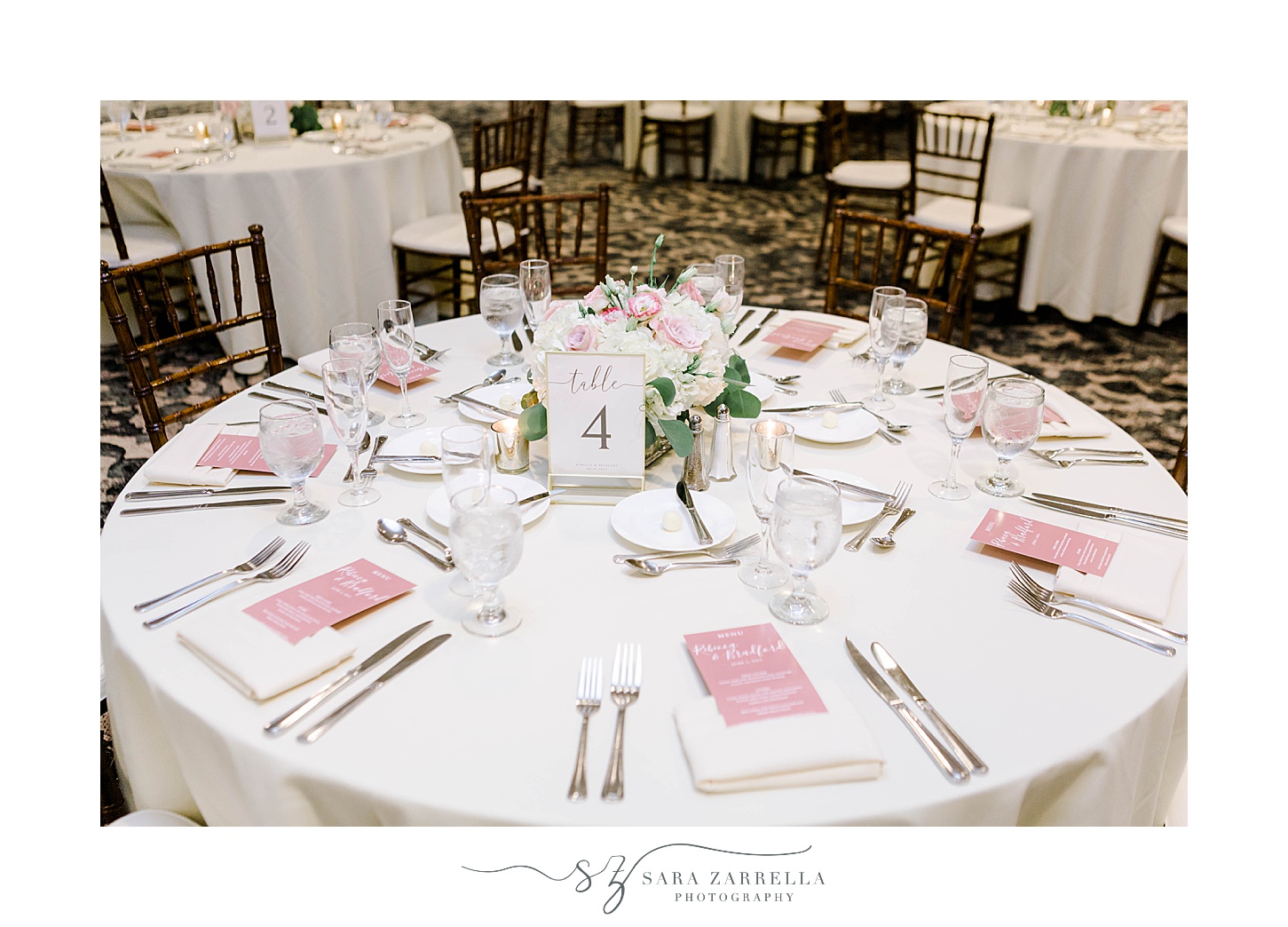 wedding reception at the Hotel Viking with pink and white place settings