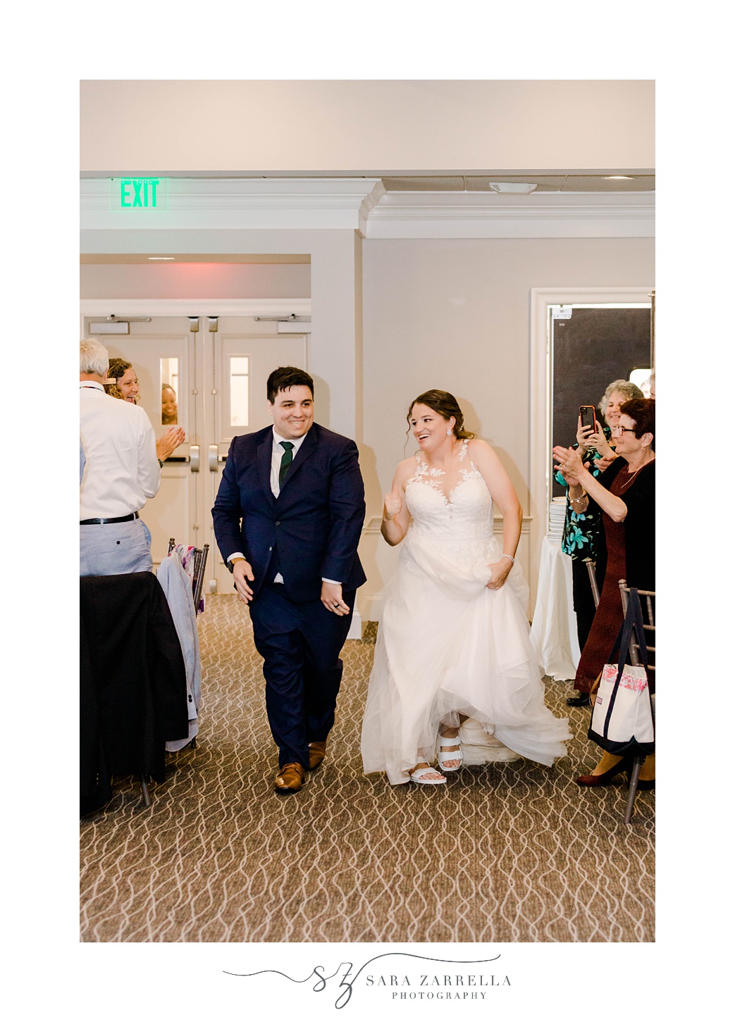 bride and groom dance into wedding reception in Warwick RI